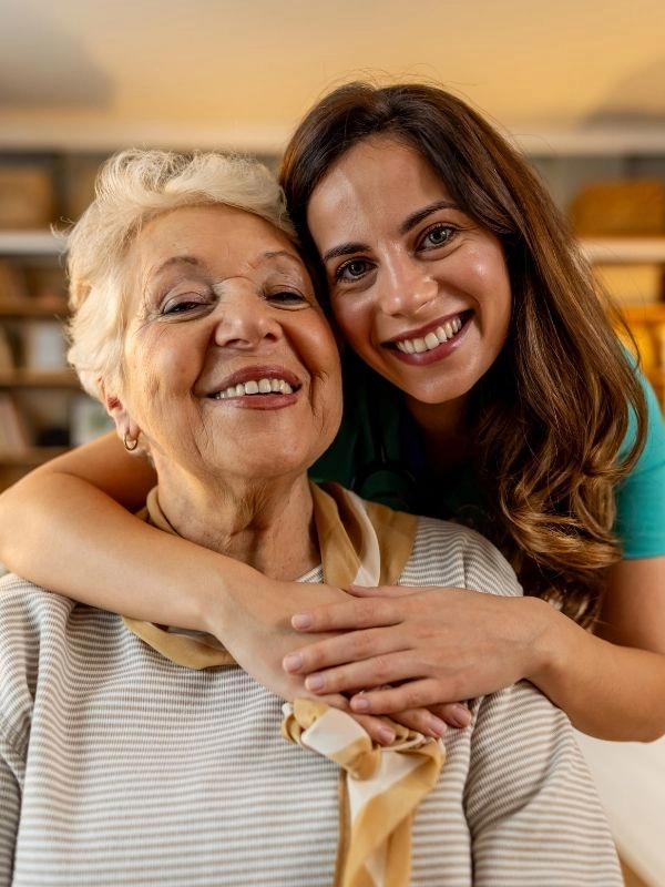 caregiver hugging senior 2