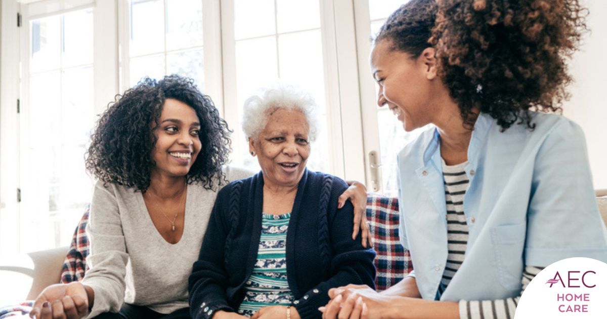 Caregiver talking to a family about Elderly Care