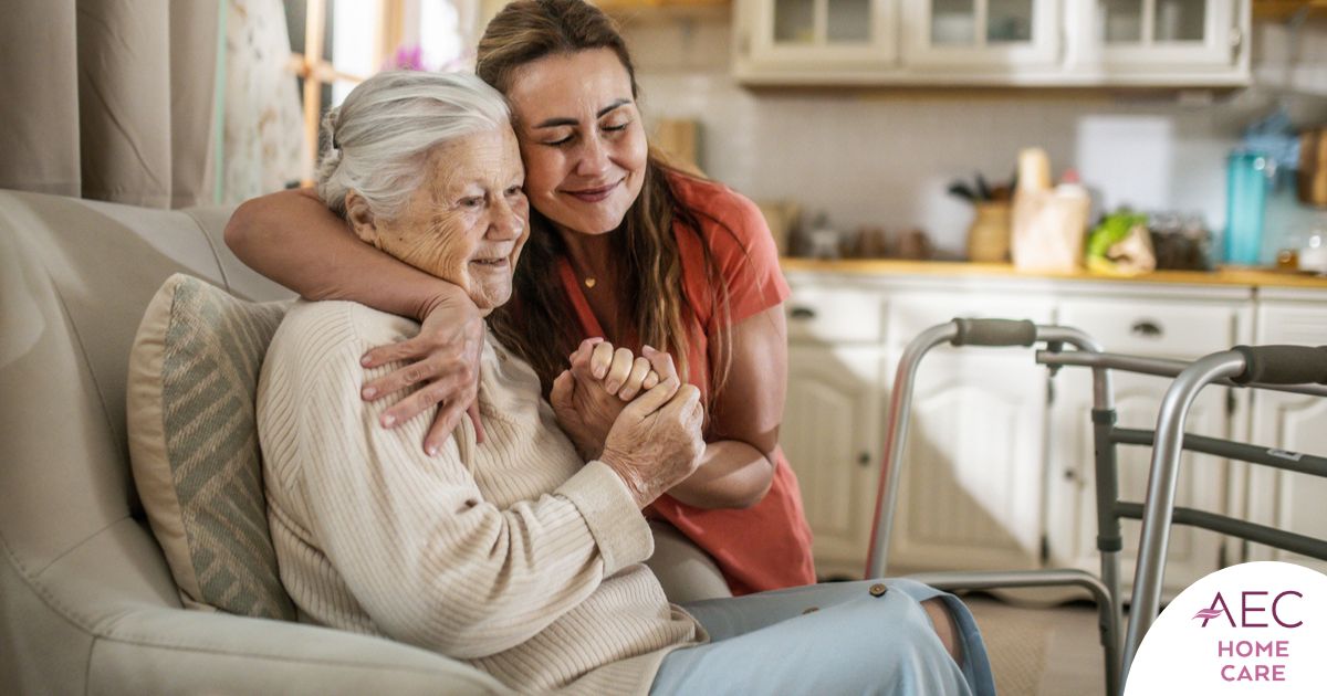 Caregiver supporting an elderly woman in the transition to senior home care